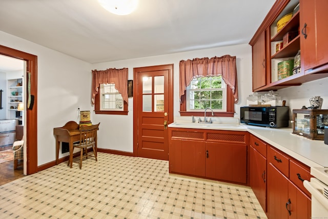 1775 Orchard Hill Rd, Cheshire, CT 06410 - kitchen featuring black microwave, open shelves, and light countertops