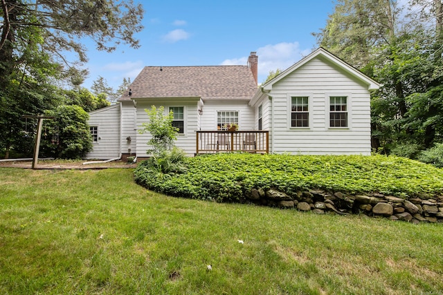 1775 Orchard Hill Rd, Cheshire, CT 06410 - rear view of property with a chimney, a lawn, and roof with shingles