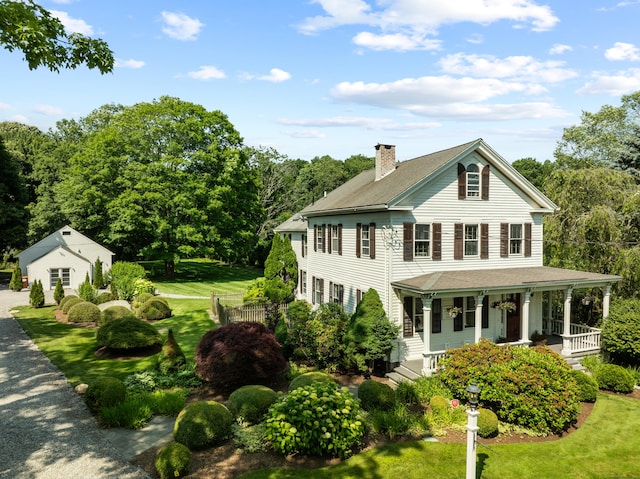 109 Boston Post Rd, Madison, CT 06443 - view of front of property with a chimney, covered porch, and a front yard