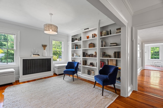 109 Boston Post Rd, Madison, CT 06443 - living area with hardwood / wood-style floors, plenty of natural light, and crown molding