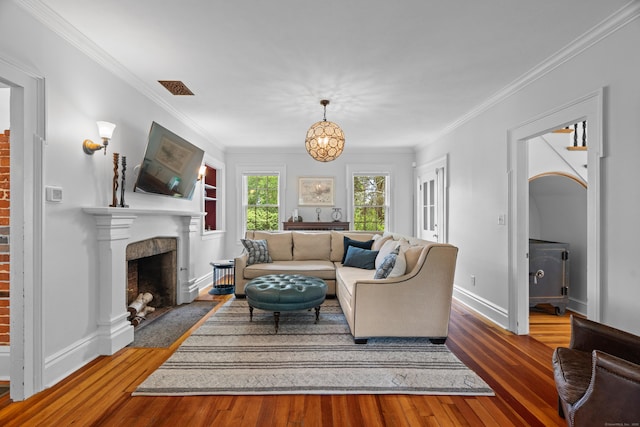 109 Boston Post Rd, Madison, CT 06443 - living area with a fireplace with flush hearth, wood finished floors, and crown molding