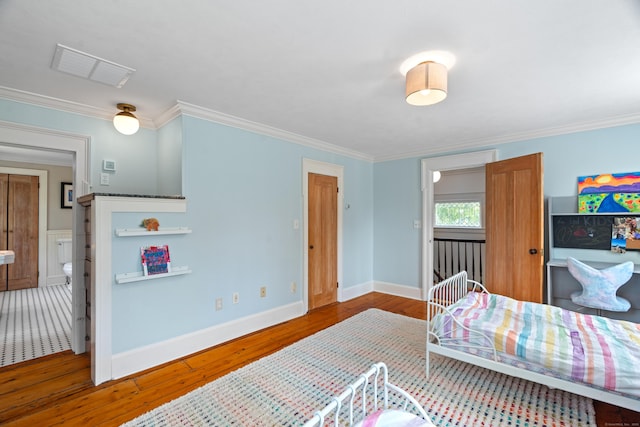 109 Boston Post Rd, Madison, CT 06443 - bedroom with wood-type flooring and crown molding