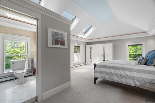 109 Boston Post Rd, Madison, CT 06443 - bedroom with a skylight, multiple windows, baseboard heating, a baseboard radiator, and lofted ceiling