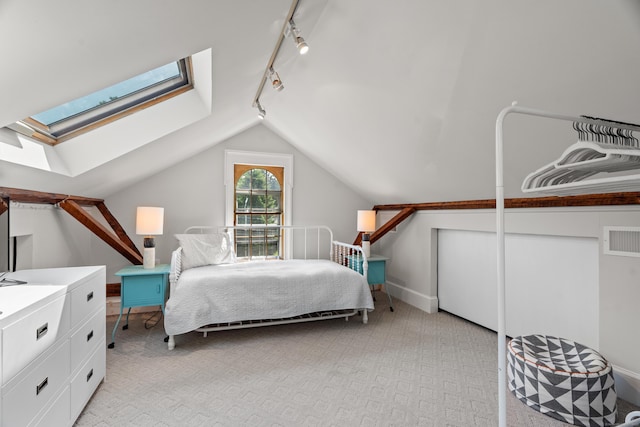109 Boston Post Rd, Madison, CT 06443 - bedroom featuring rail lighting, a skylight, light carpet, and vaulted ceiling