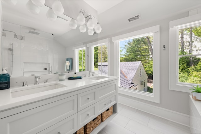 289 Wahackme Rd, New Canaan, CT 06840 - full bath with a stall shower, double vanity, tile patterned floors, and lofted ceiling