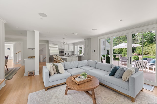 289 Wahackme Rd, New Canaan, CT 06840 - living room featuring light wood-type flooring, french doors, and recessed lighting