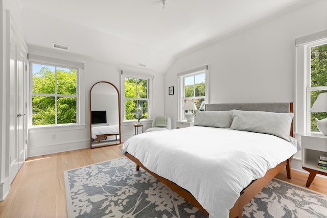 289 Wahackme Rd, New Canaan, CT 06840 - bedroom featuring light wood-style flooring, lofted ceiling, and ornamental molding