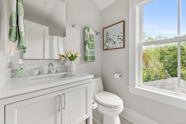 289 Wahackme Rd, New Canaan, CT 06840 - bathroom with vanity and vaulted ceiling