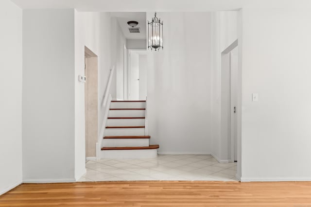 170 Southern Blvd, Danbury, CT 06810 - stairs featuring a chandelier and tile patterned flooring