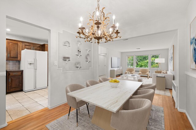 170 Southern Blvd, Danbury, CT 06810 - dining room featuring a chandelier and light wood-style flooring