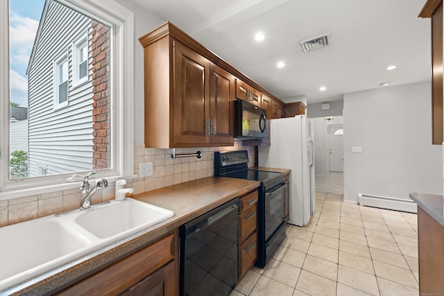 170 Southern Blvd, Danbury, CT 06810 - kitchen with black appliances, a baseboard heating unit, light tile patterned flooring, recessed lighting, and backsplash