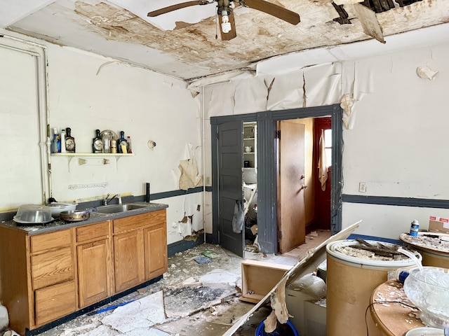 338 Sigourney St, Hartford, CT 06112 - kitchen with ceiling fan, dark countertops, brown cabinets, and open shelves