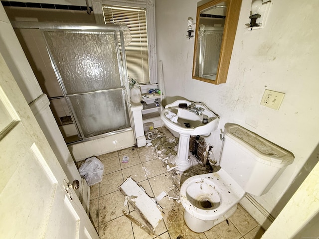 338 Sigourney St, Hartford, CT 06112 - full bathroom with an enclosed shower and tile patterned flooring
