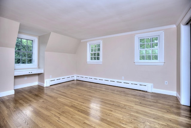 29 Bradley Rd, Weston, CT 06883 - bonus room featuring a baseboard heating unit, wood finished floors, and vaulted ceiling