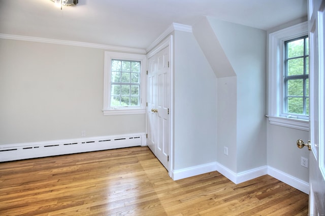 29 Bradley Rd, Weston, CT 06883 - additional living space featuring plenty of natural light, a baseboard radiator, and light wood-style flooring