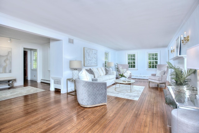 29 Bradley Rd, Weston, CT 06883 - living area with hardwood / wood-style flooring, crown molding, and baseboard heating