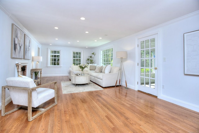 29 Bradley Rd, Weston, CT 06883 - living room with ornamental molding, light wood-style floors, recessed lighting, and a fireplace
