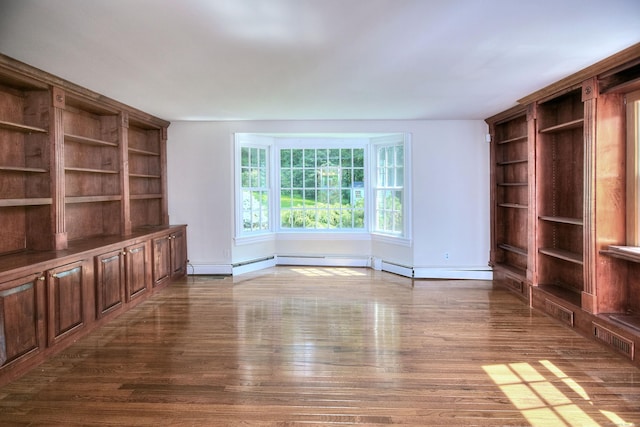 29 Bradley Rd, Weston, CT 06883 - unfurnished living room featuring wood finished floors and built in features