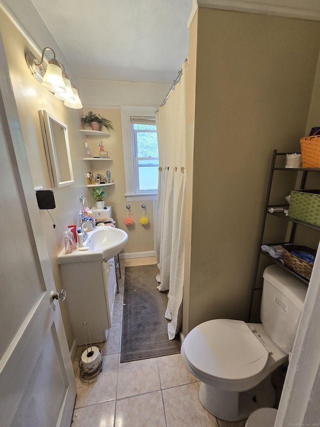 48 Scott St, East Hartford, CT 06118 - bathroom with vanity, tile patterned floors, and a shower with curtain