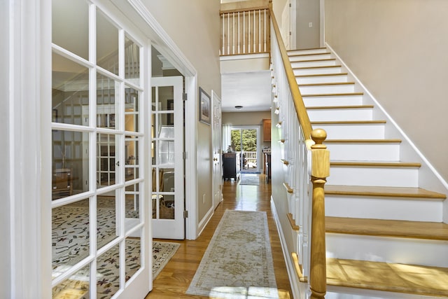 18 Jeans Ct, Woodstock, CT 06281 - entryway featuring french doors, wood finished floors, and stairs