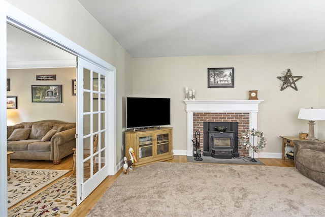 18 Jeans Ct, Woodstock, CT 06281 - living area featuring a wood stove and wood finished floors