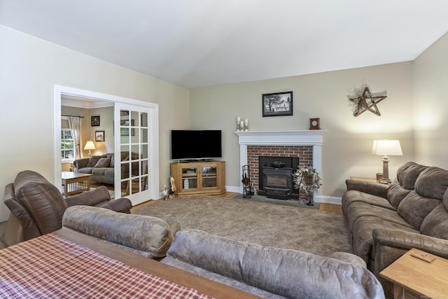 18 Jeans Ct, Woodstock, CT 06281 - living area featuring a wood stove and wood finished floors