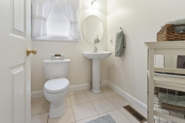 18 Jeans Ct, Woodstock, CT 06281 - half bathroom featuring toilet and tile patterned floors