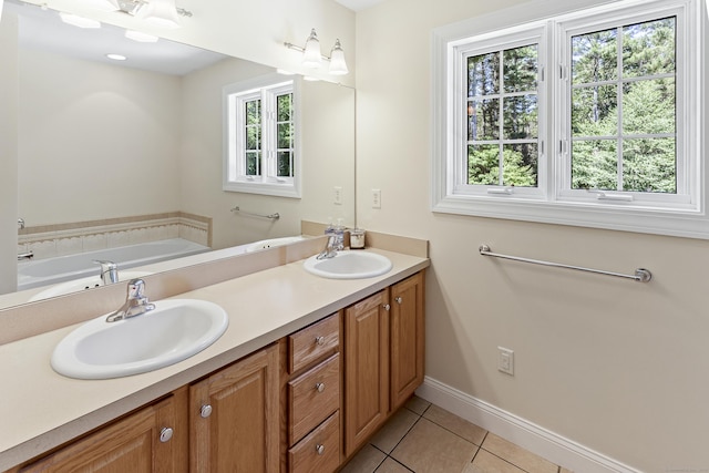 18 Jeans Ct, Woodstock, CT 06281 - full bathroom featuring tile patterned floors, double vanity, and a bath