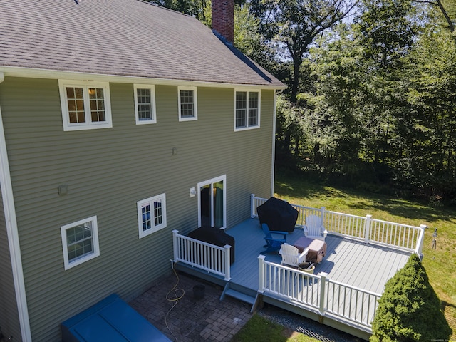 18 Jeans Ct, Woodstock, CT 06281 - rear view of house featuring a chimney, a deck, and an outdoor hangout area