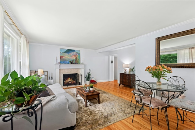 11 Old Kings Hwy, New Canaan, CT 06840 - living room featuring wood finished floors, a tile fireplace, healthy amount of natural light, and ornamental molding