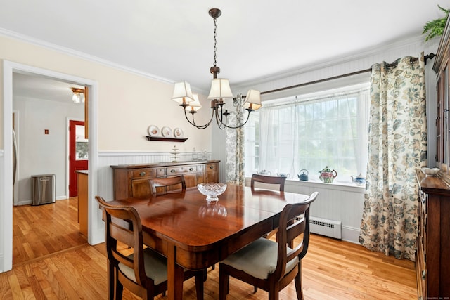 11 Old Kings Hwy, New Canaan, CT 06840 - dining space with ornamental molding, light wood-style flooring, a chandelier, a wainscoted wall, and baseboard heating