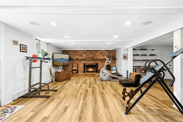 11 Old Kings Hwy, New Canaan, CT 06840 - workout room with wood finished floors, a fireplace, and recessed lighting