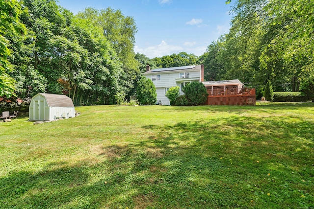 11 Old Kings Hwy, New Canaan, CT 06840 - view of green lawn with a storage shed and a wooden deck