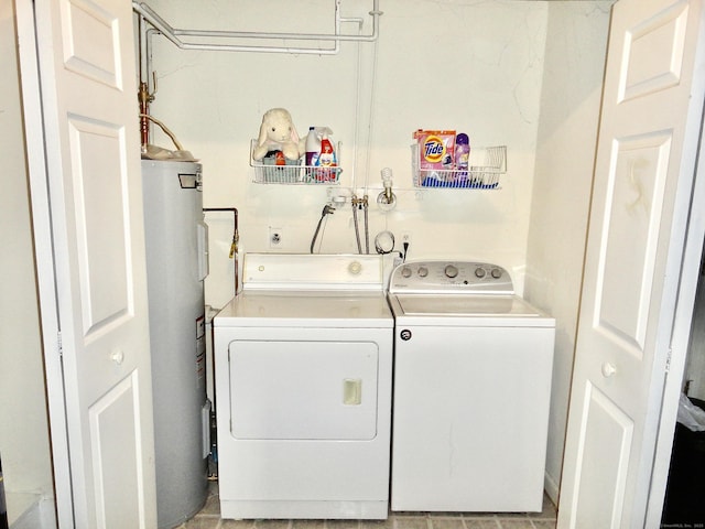 1275 Winsted Rd Unit 101, Torrington, CT 06790 - washroom with electric water heater and washing machine and dryer