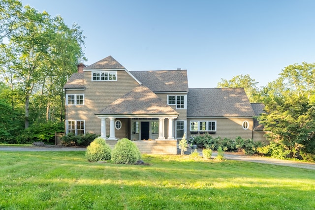 98 Ryefield Rd, Middletown, CT 06457 - shingle-style home with a porch, a front lawn, roof with shingles, and a chimney