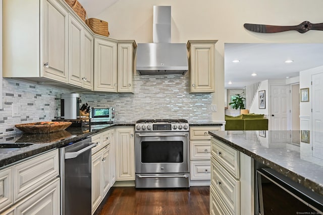 311 Wilton Rd E, Ridgefield, CT 06877 - kitchen with stainless steel appliances, wall chimney exhaust hood, wine cooler, cream cabinetry, and dark wood-style flooring