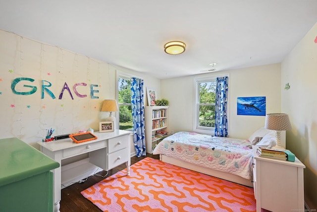 311 Wilton Rd E, Ridgefield, CT 06877 - bedroom with multiple windows and dark wood-style floors