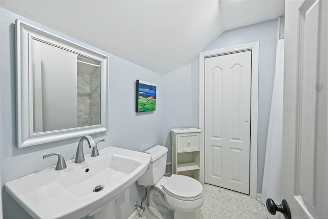 311 Wilton Rd E, Ridgefield, CT 06877 - bathroom with lofted ceiling and toilet