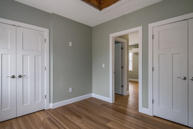 40 Allyn St, Groton, CT 06355 - unfurnished bedroom featuring wood finished floors and baseboards