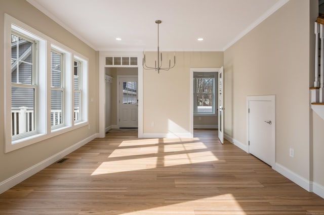 40 Allyn St, Groton, CT 06355 - unfurnished dining area featuring a chandelier, plenty of natural light, crown molding, light wood finished floors, and recessed lighting