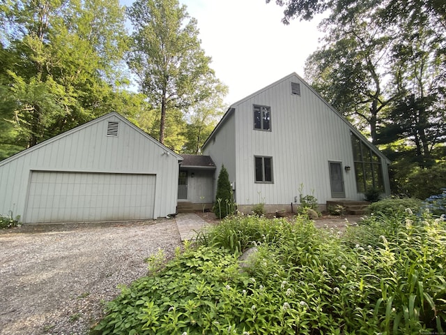 31 Weiss Rd, Haddam, CT 06438 - view of front facade featuring gravel driveway and an attached garage