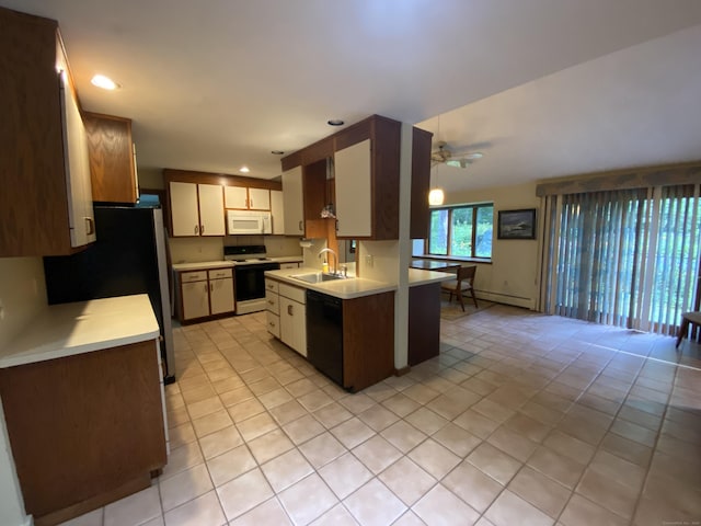 31 Weiss Rd, Haddam, CT 06438 - kitchen with white appliances, light countertops, light tile patterned floors, ceiling fan, and recessed lighting
