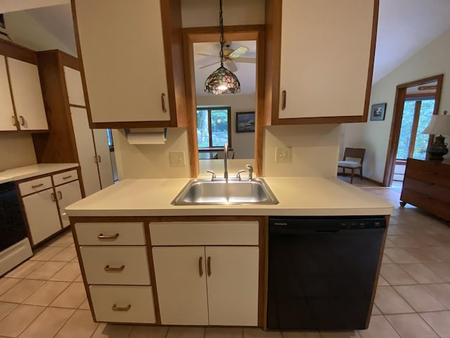 31 Weiss Rd, Haddam, CT 06438 - kitchen featuring black dishwasher, lofted ceiling, light countertops, light tile patterned floors, and white cabinetry