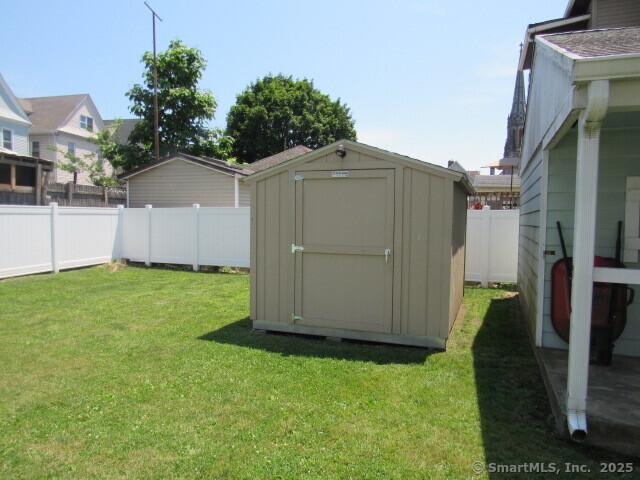76 Porter St, Bridgeport, CT 06606 - view of shed featuring a fenced backyard