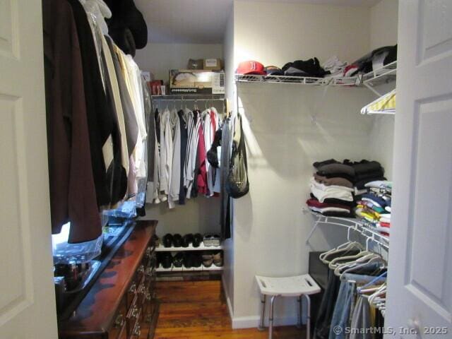 76 Porter St, Bridgeport, CT 06606 - walk in closet featuring wood finished floors