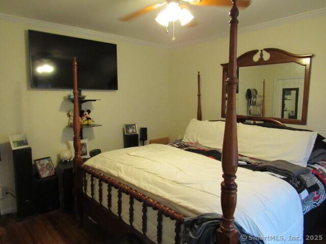 76 Porter St, Bridgeport, CT 06606 - bedroom featuring crown molding, dark wood-style flooring, and a ceiling fan