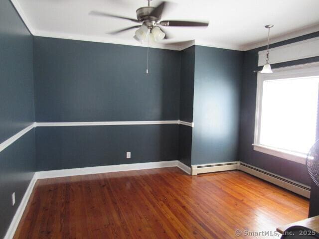 76 Porter St, Bridgeport, CT 06606 - spare room with wood finished floors, ceiling fan, and baseboard heating