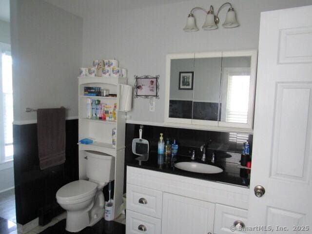 76 Porter St, Bridgeport, CT 06606 - bathroom with plenty of natural light and vanity