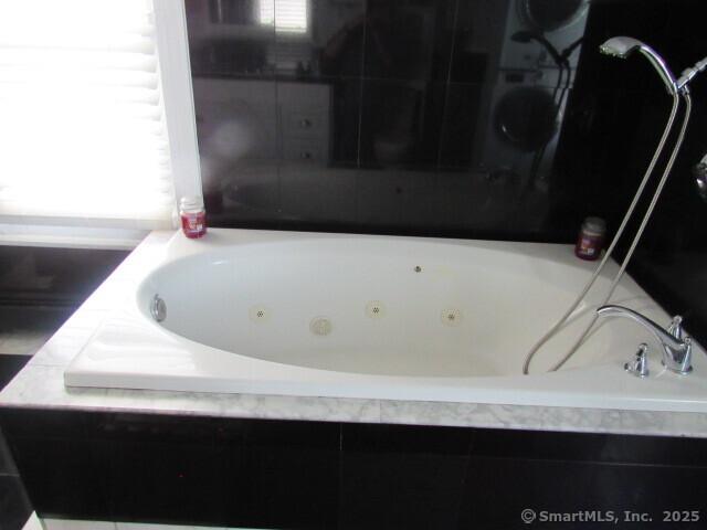 76 Porter St, Bridgeport, CT 06606 - full bath featuring a whirlpool tub