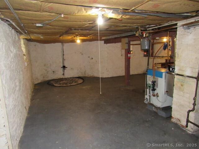76 Porter St, Bridgeport, CT 06606 - unfinished below grade area with a heating unit